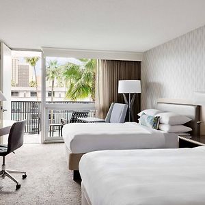 Guest Room Two Double Beds Balcony Pool View